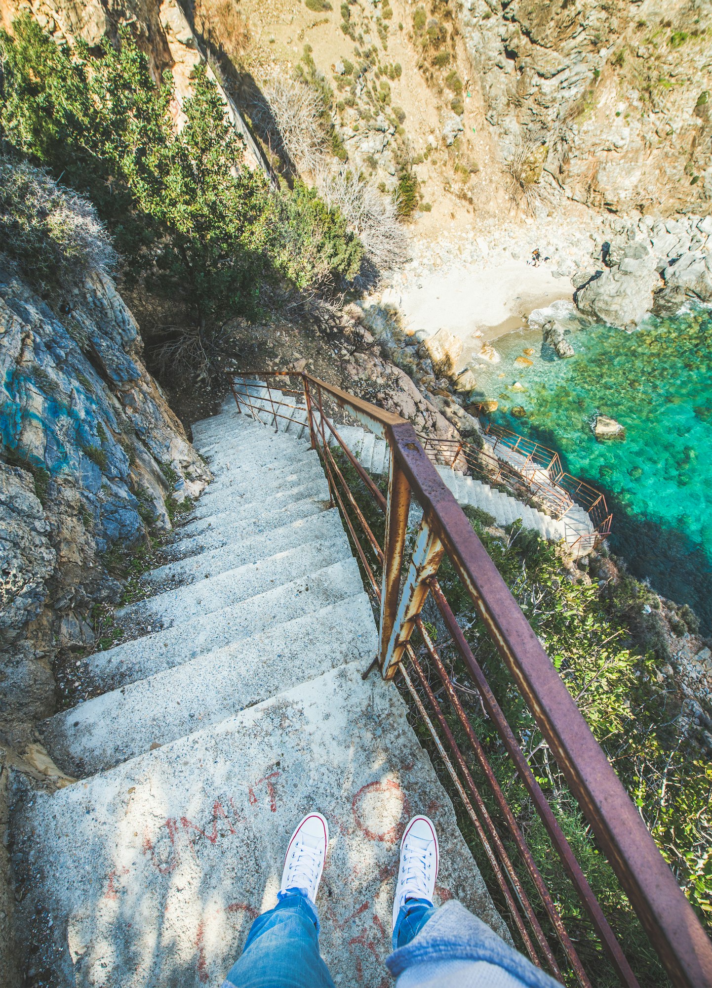 Stairs down to secret lagoon at Mediterranean sea coast